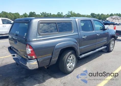 2015 Toyota Tacoma Base V6 z USA, uszkodzony, nr VIN 3TMLU4EN1FM177255